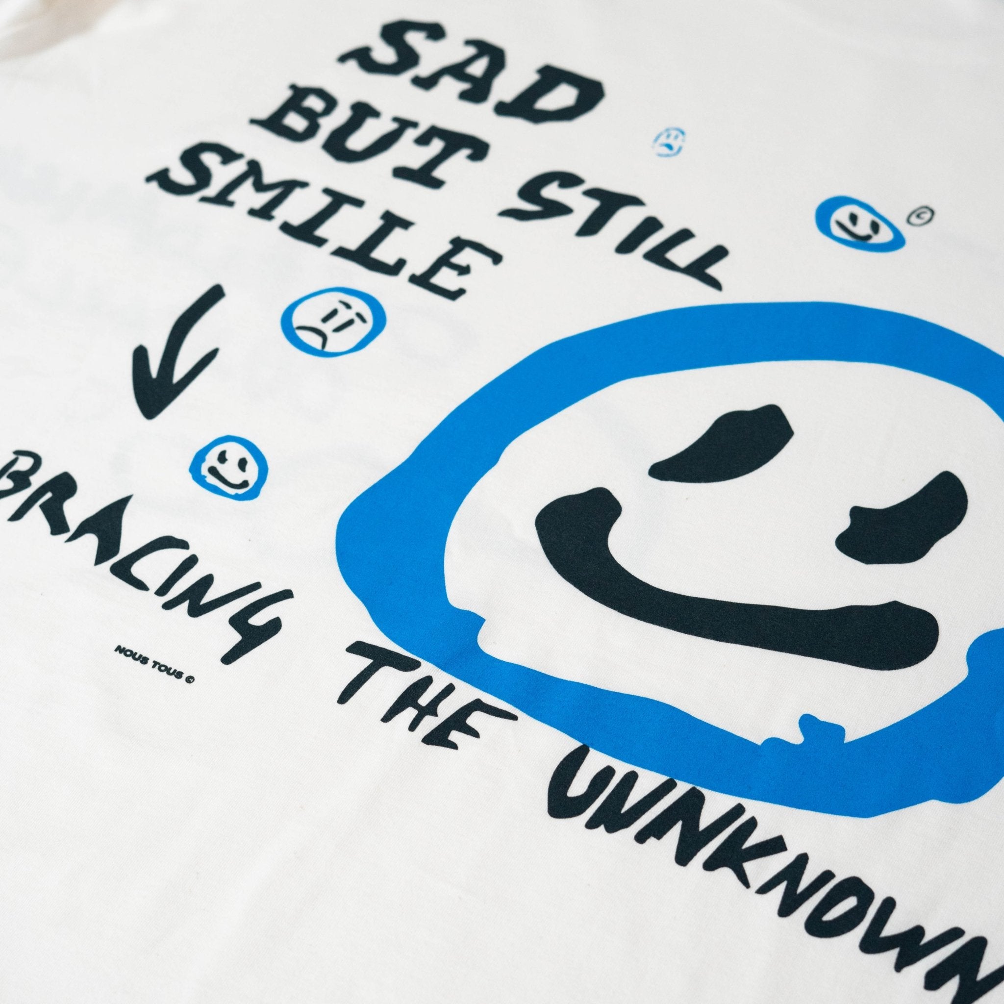 KOSZULKA SAD BUT STILL SMILE BLUE OFF WHITE - Nous Tous